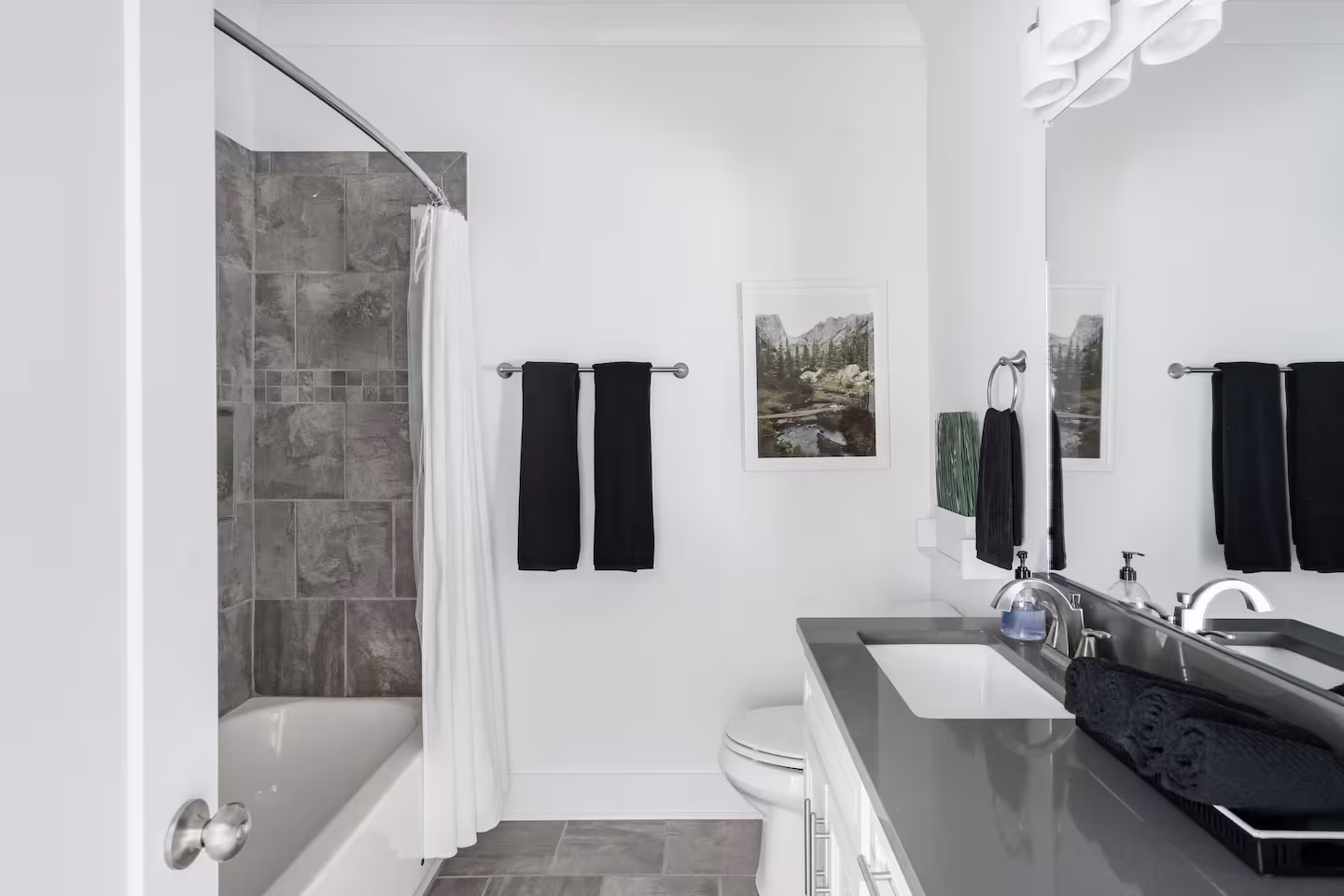 Second full bathroom with shower and tub